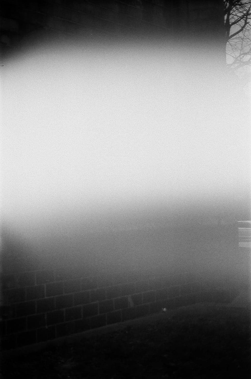 a black and white photo of concrete pillar.